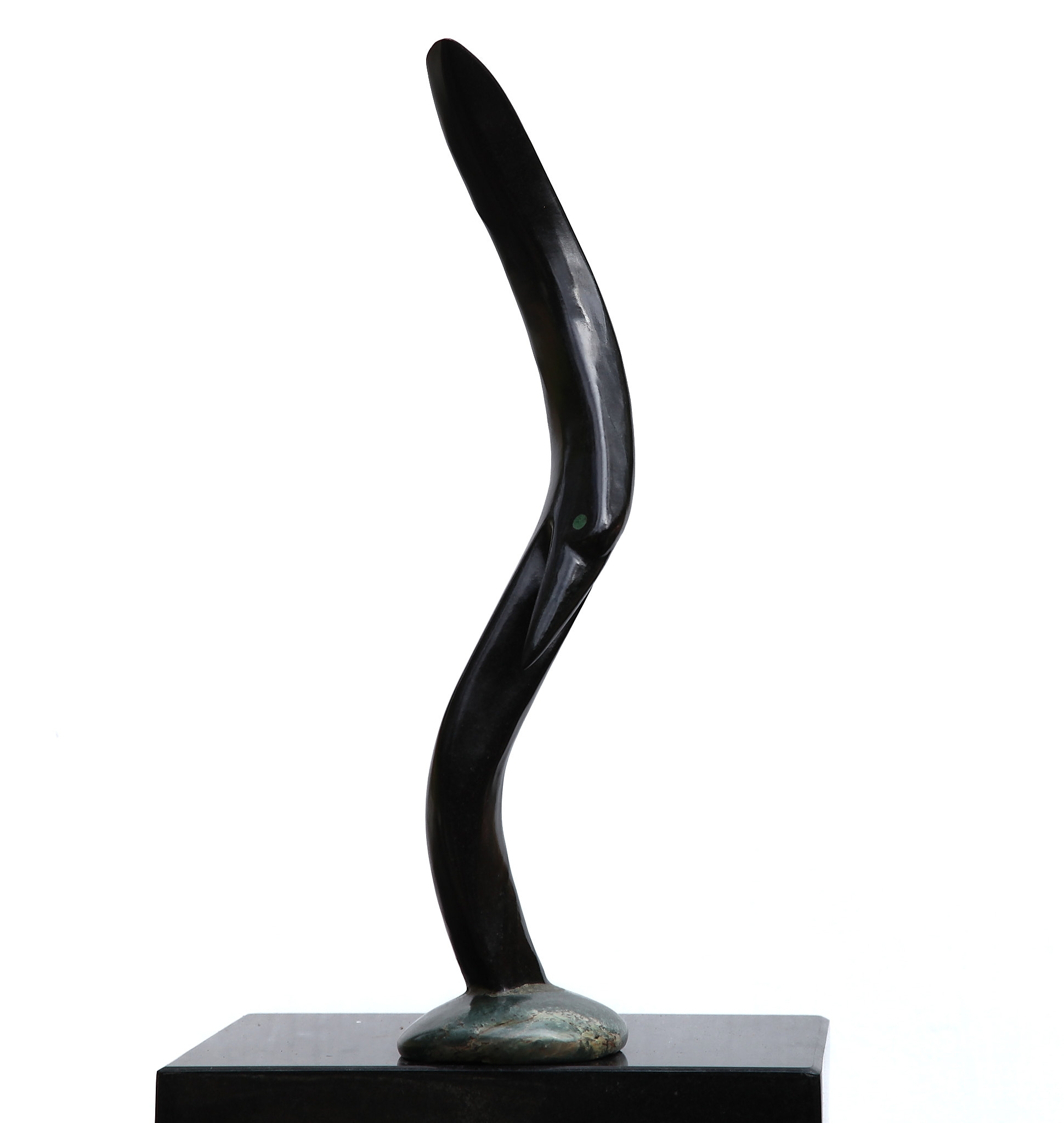 Tabletop Zimbabwean Hand carved Shona Springstone Sculpture Depicting the Flight of a Bird