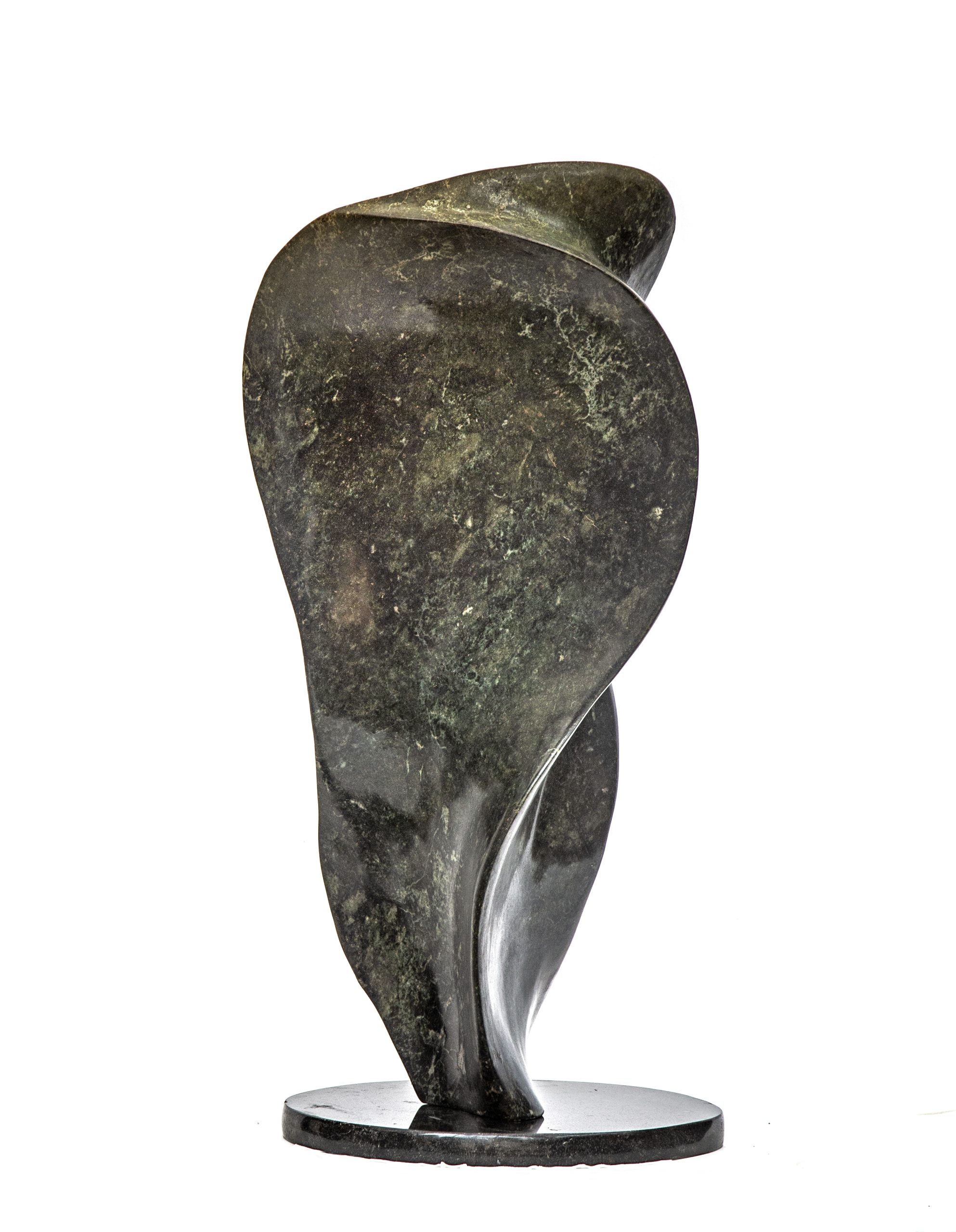 A shona opal stone sculpture of a smooth and rounded abstract shape.