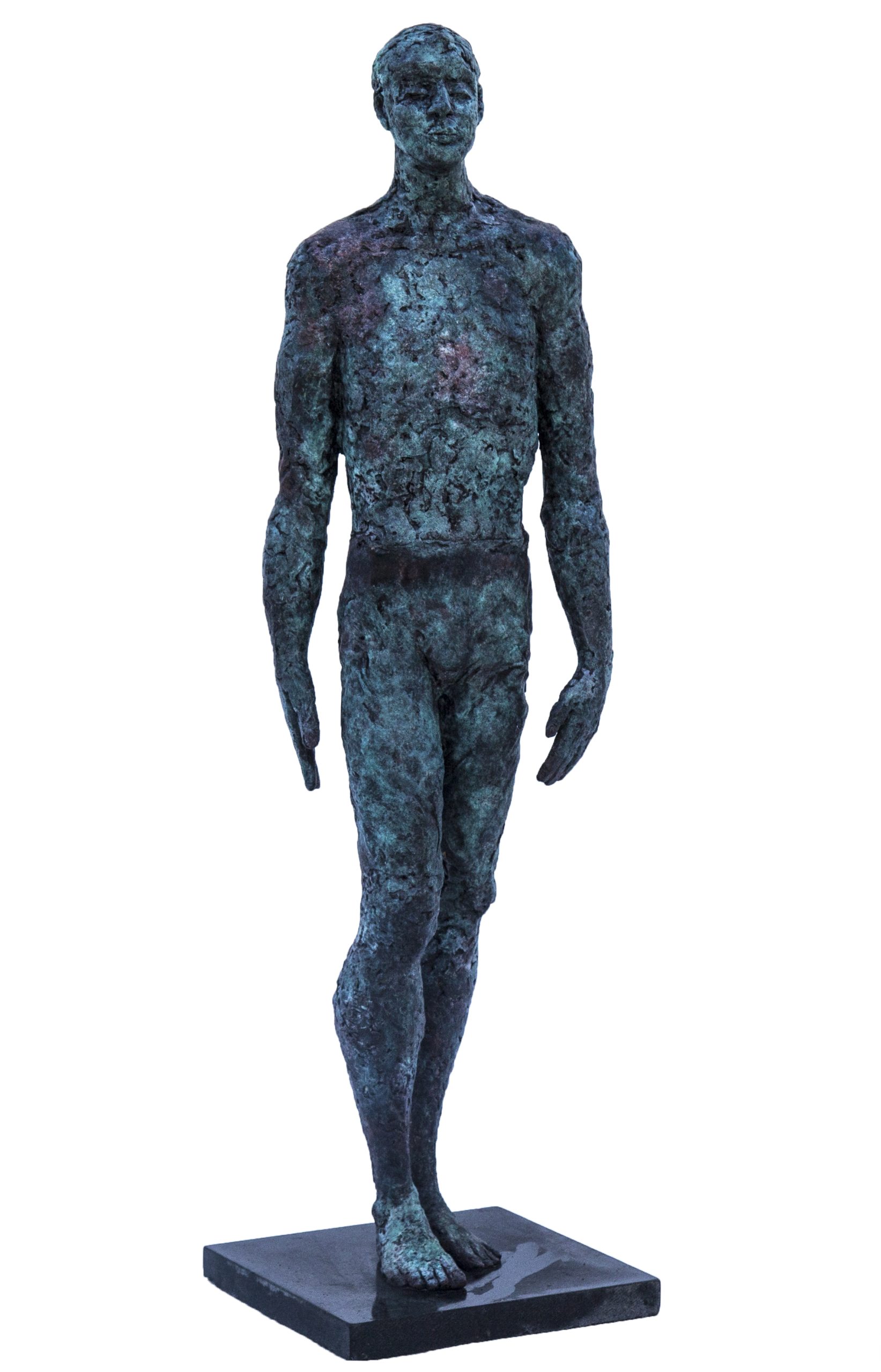 A figurative bronze sculpture of a blue man walking.
