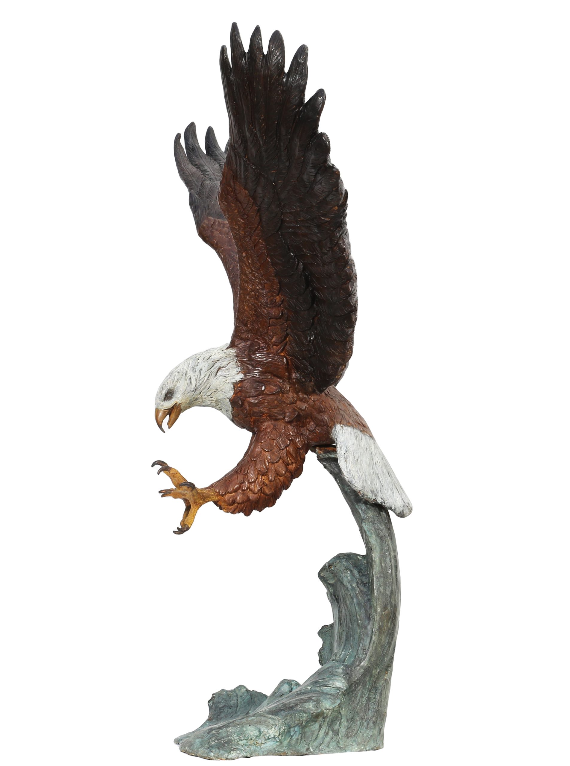 A figurative painted bronze sculpture of a bald eagle with its wings and talons outstretched, catching its prey.