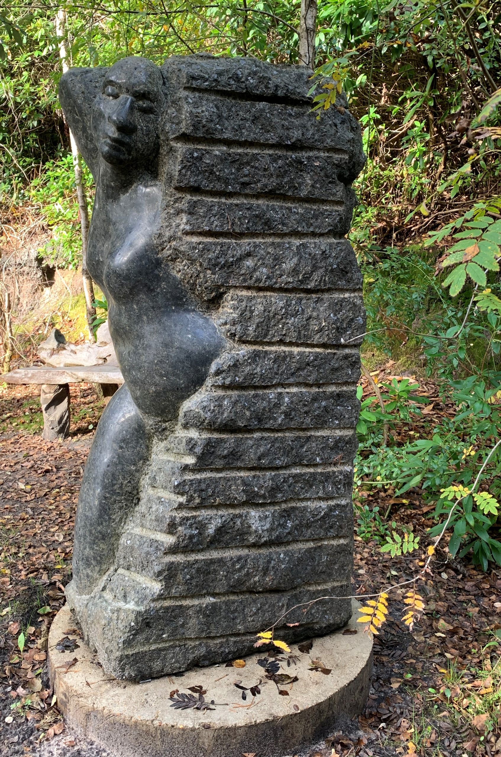Large Stone Outdoor Sculpture of a Figure Emerging from Stone