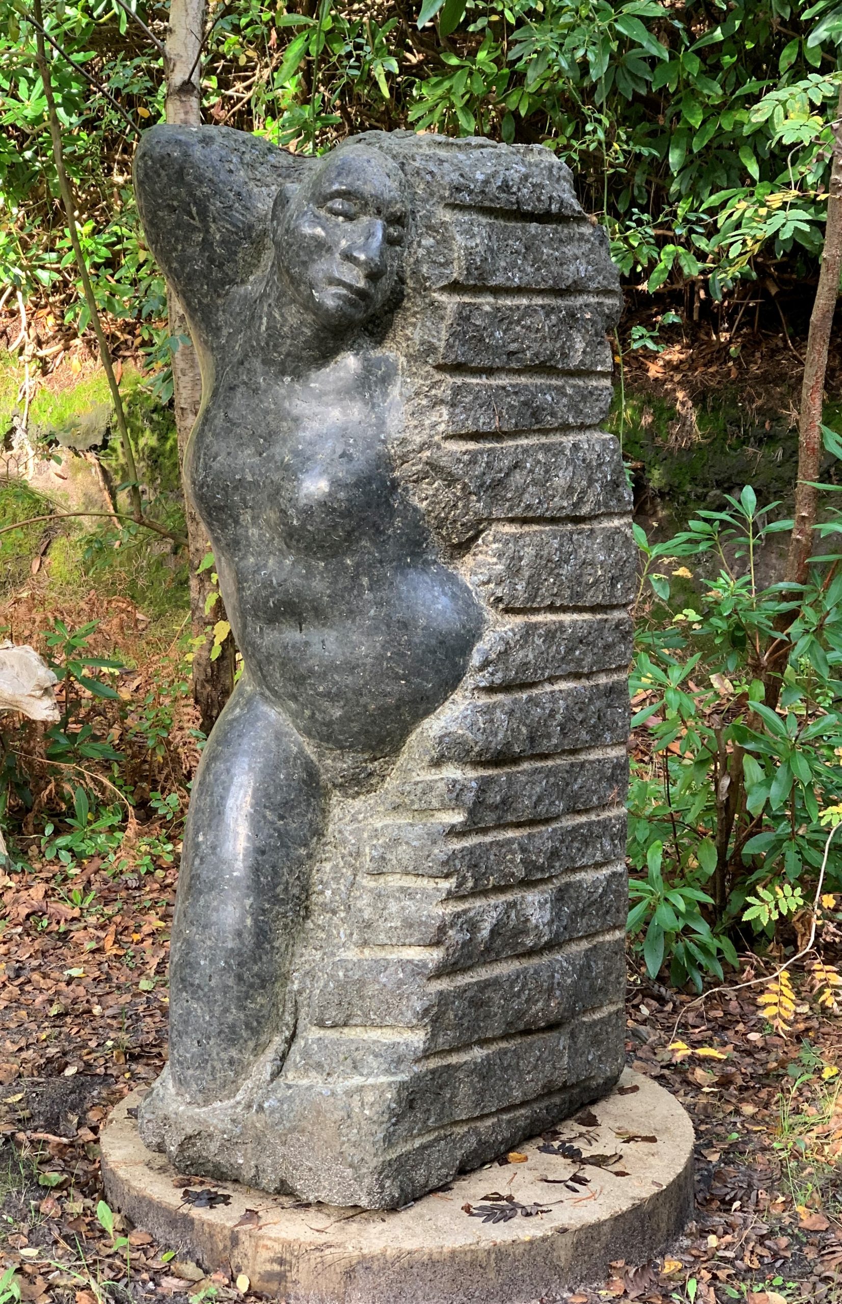 Large Stone Outdoor Sculpture of a Figure Emerging from Stone