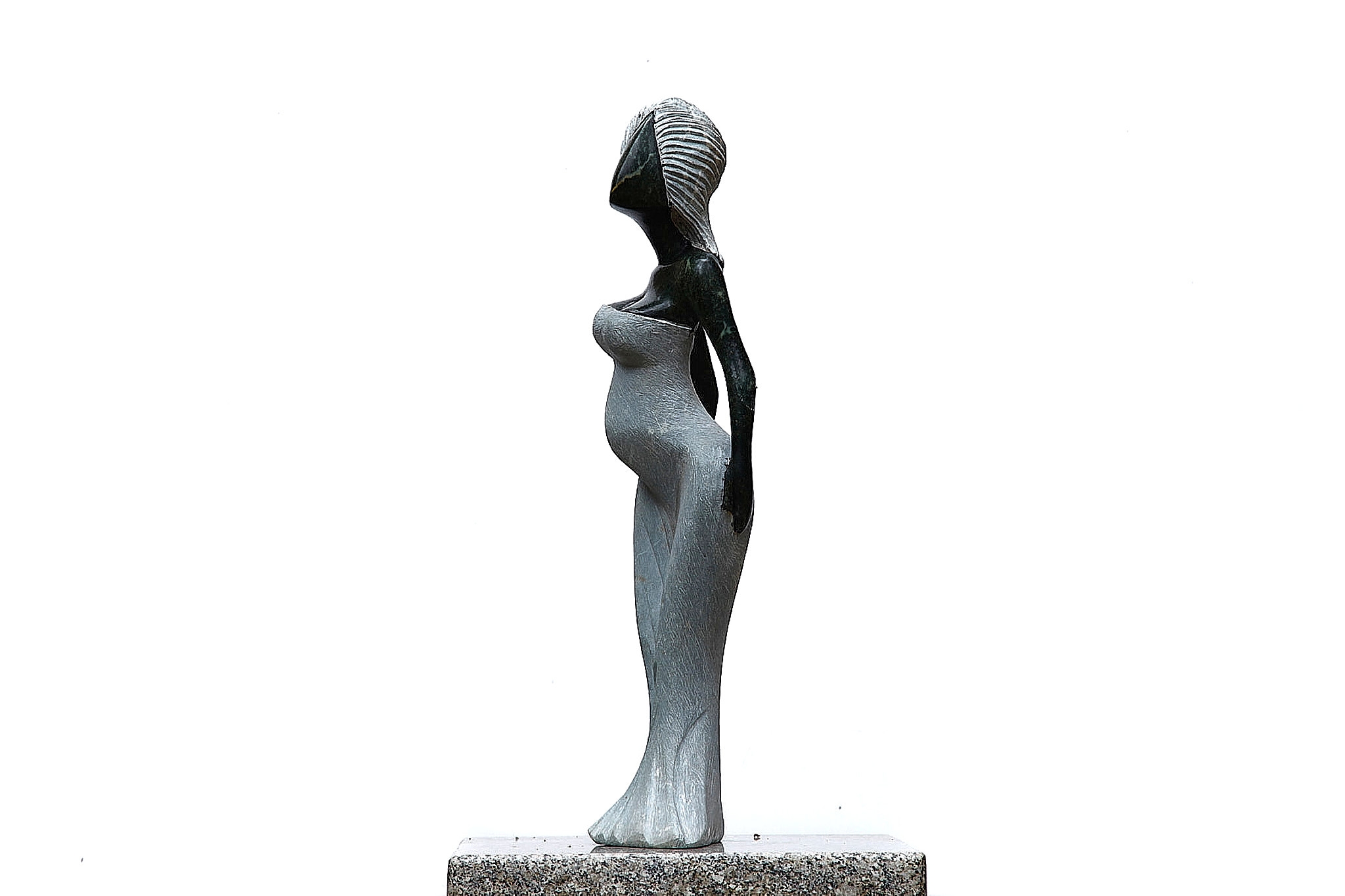 A Shona sculpture made of Opal stone of a woman in a dress.