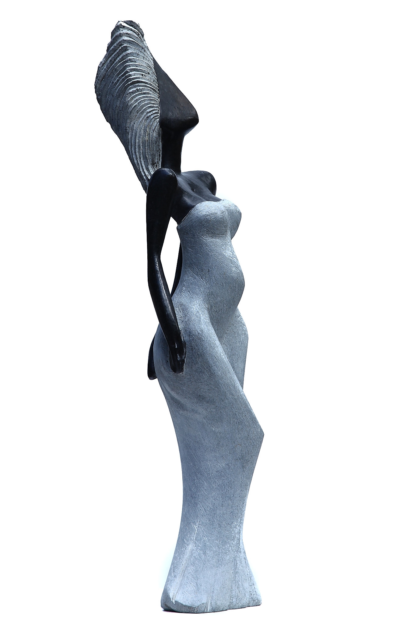 A Shona sculpture made of Opal stone, showcasing a woman in a dress.