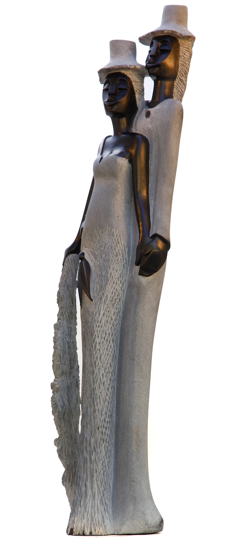A figurative Shona sculpture of a man and a woman stood with each other.