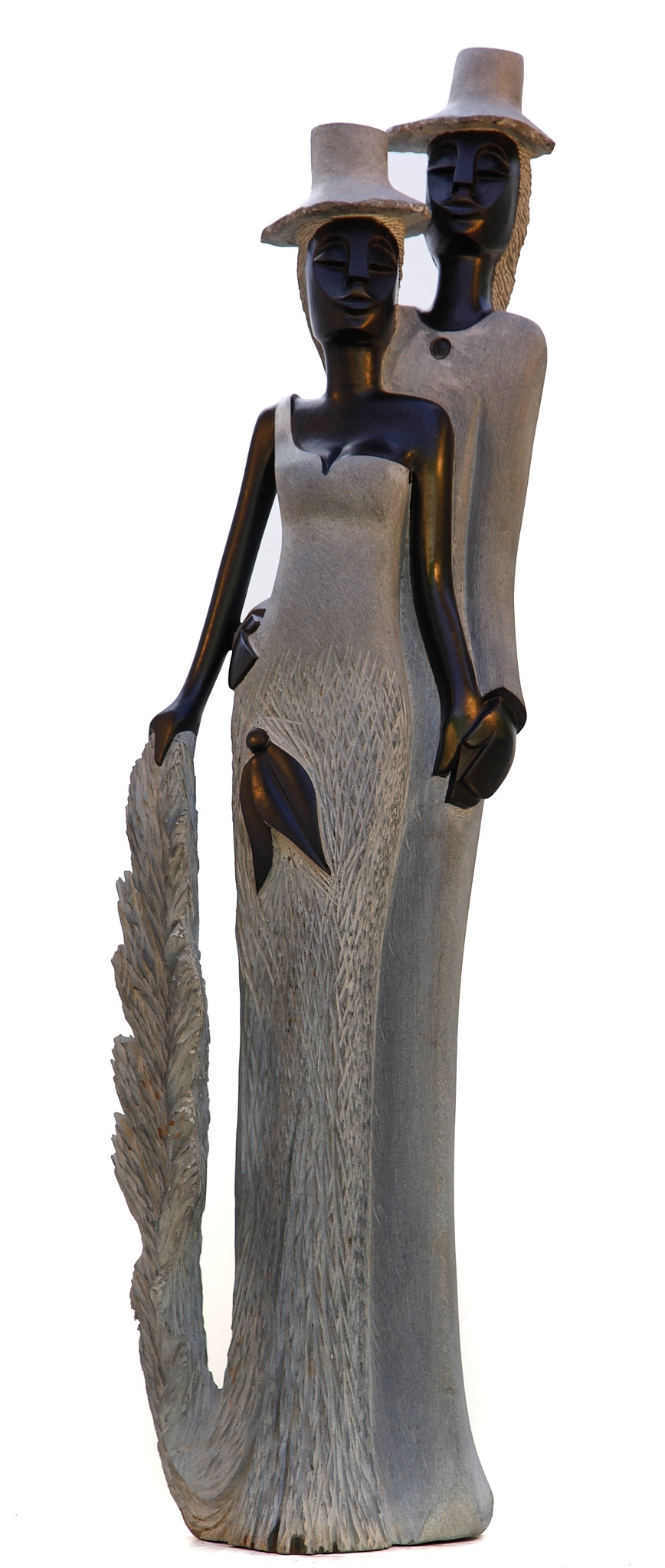 A figurative Shona sculpture of a man and a woman stood with each other.