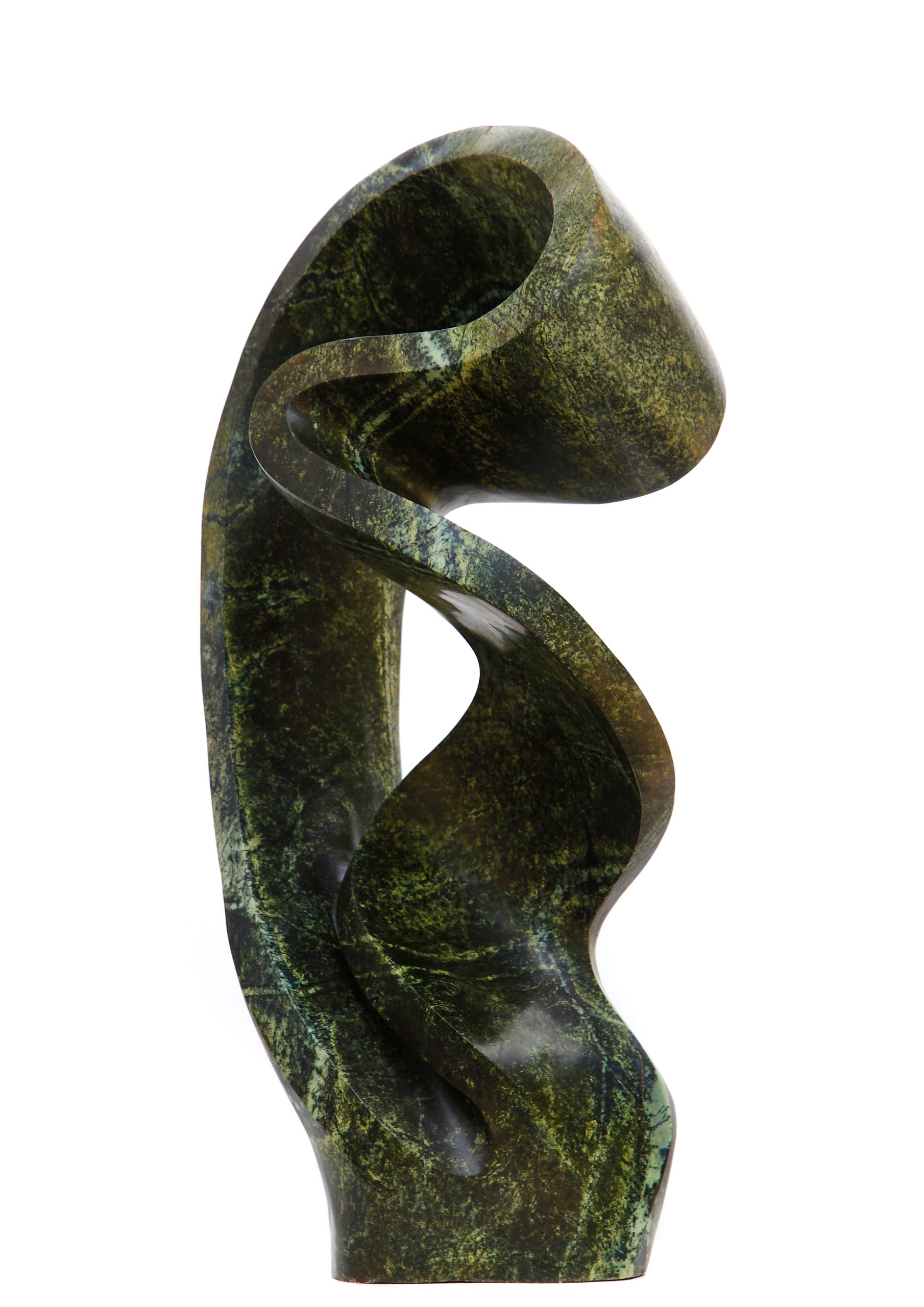 An green abstract shaped Shona sculpture made of Avocado stone.