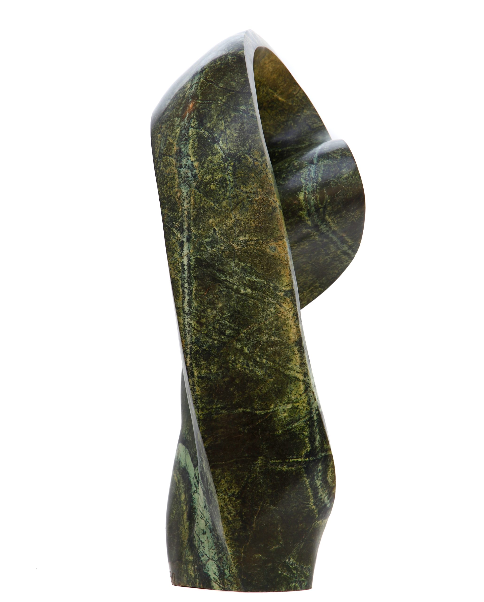 An green abstract shaped Shona sculpture made of Avocado stone.