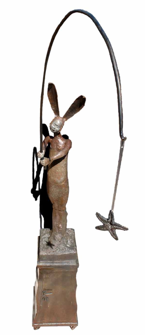 A figurative bronze sculpture of a person in a bunny outfit with a fishing rod.