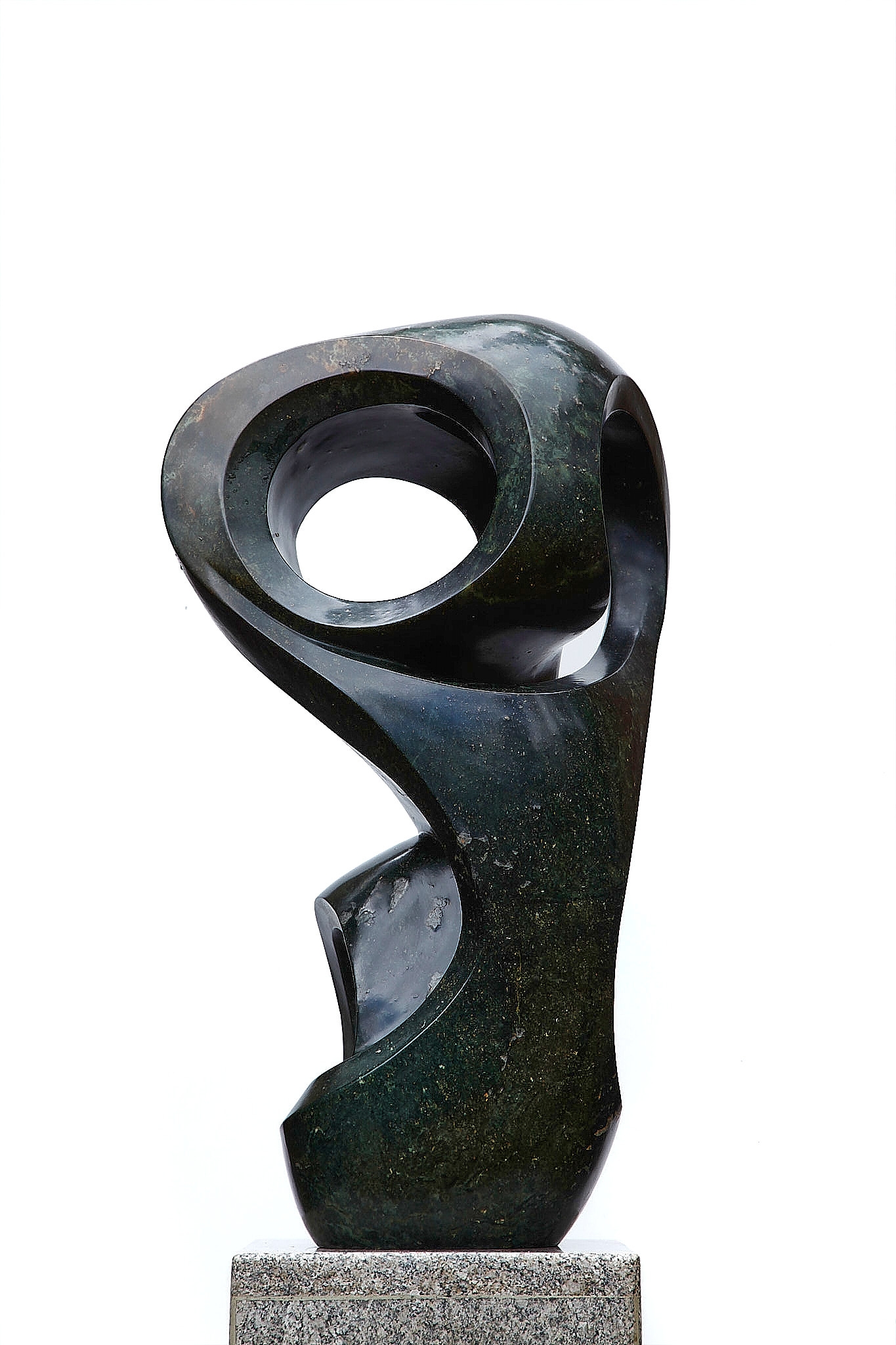 An abstract Shona sculpture made of Opal stone.