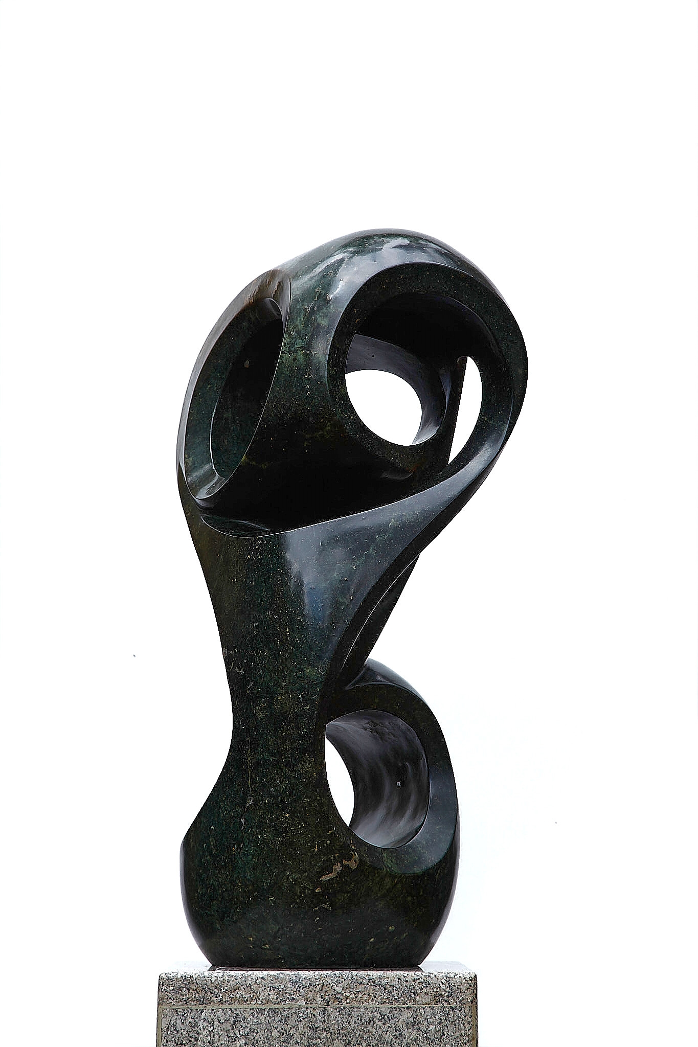 An abstract Shona sculpture made of Opal stone.