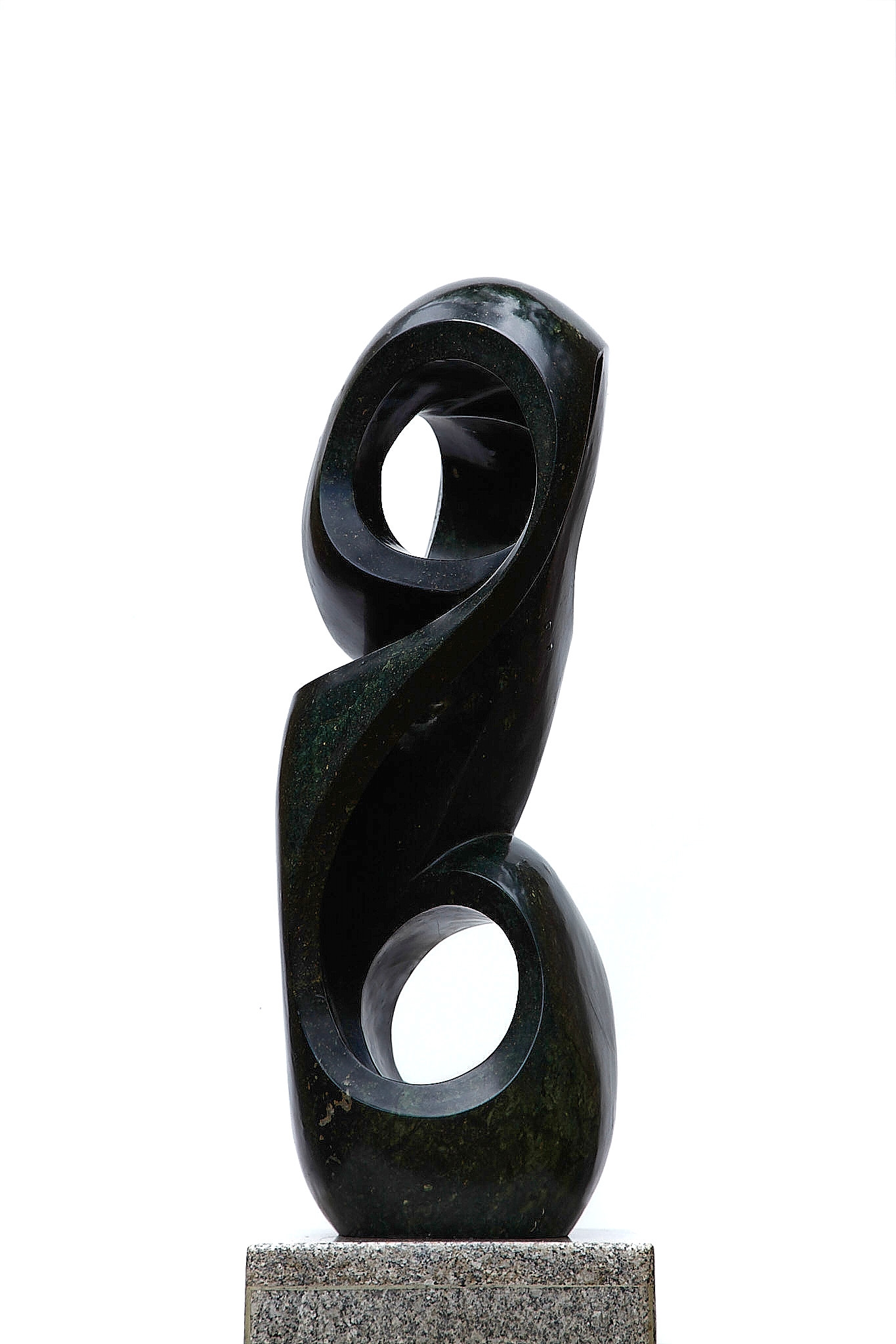 An abstract Shona sculpture made of Opal stone.