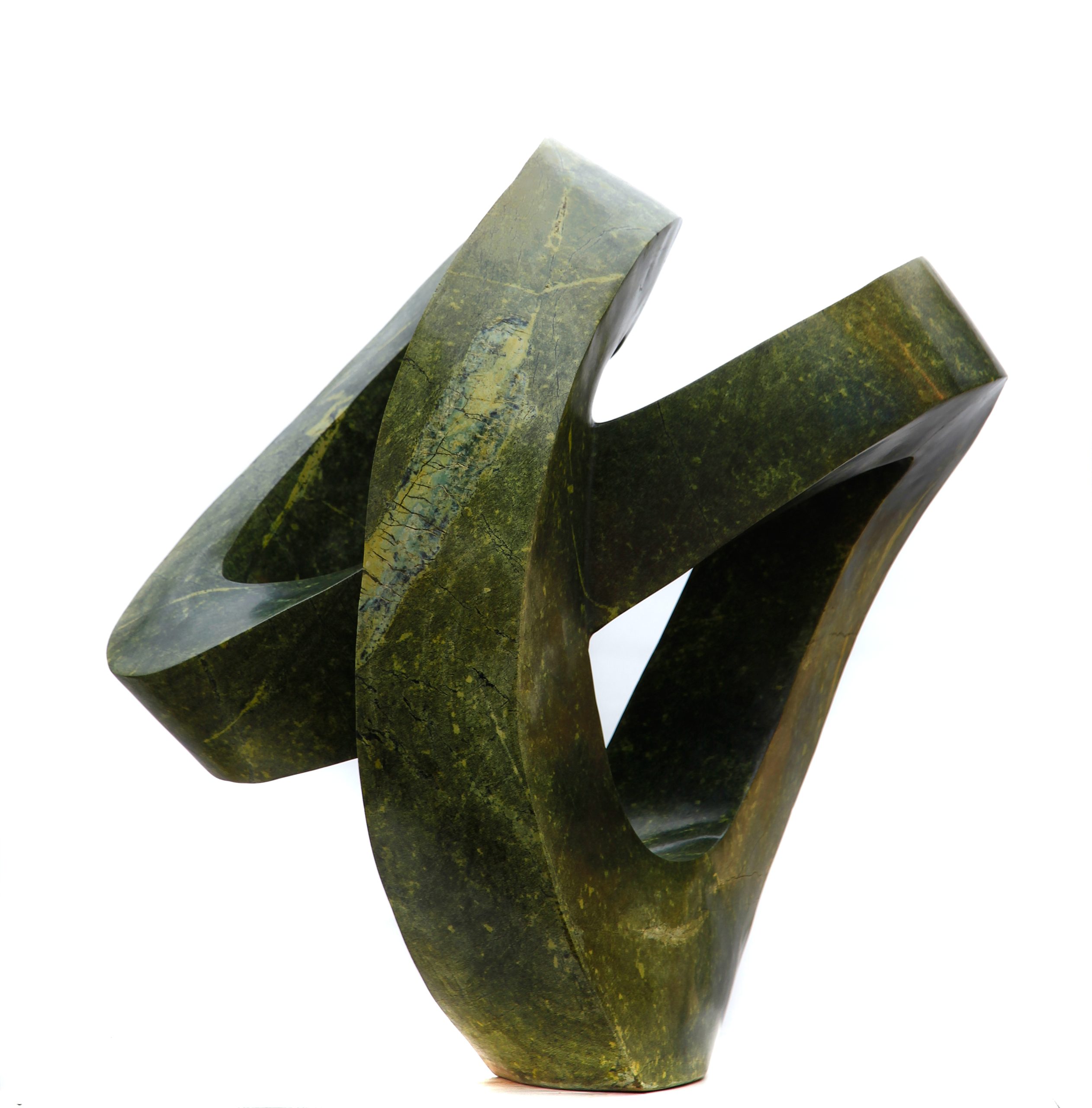 A green, intertwining, abstract Shona sculpture made of Avocado stone.