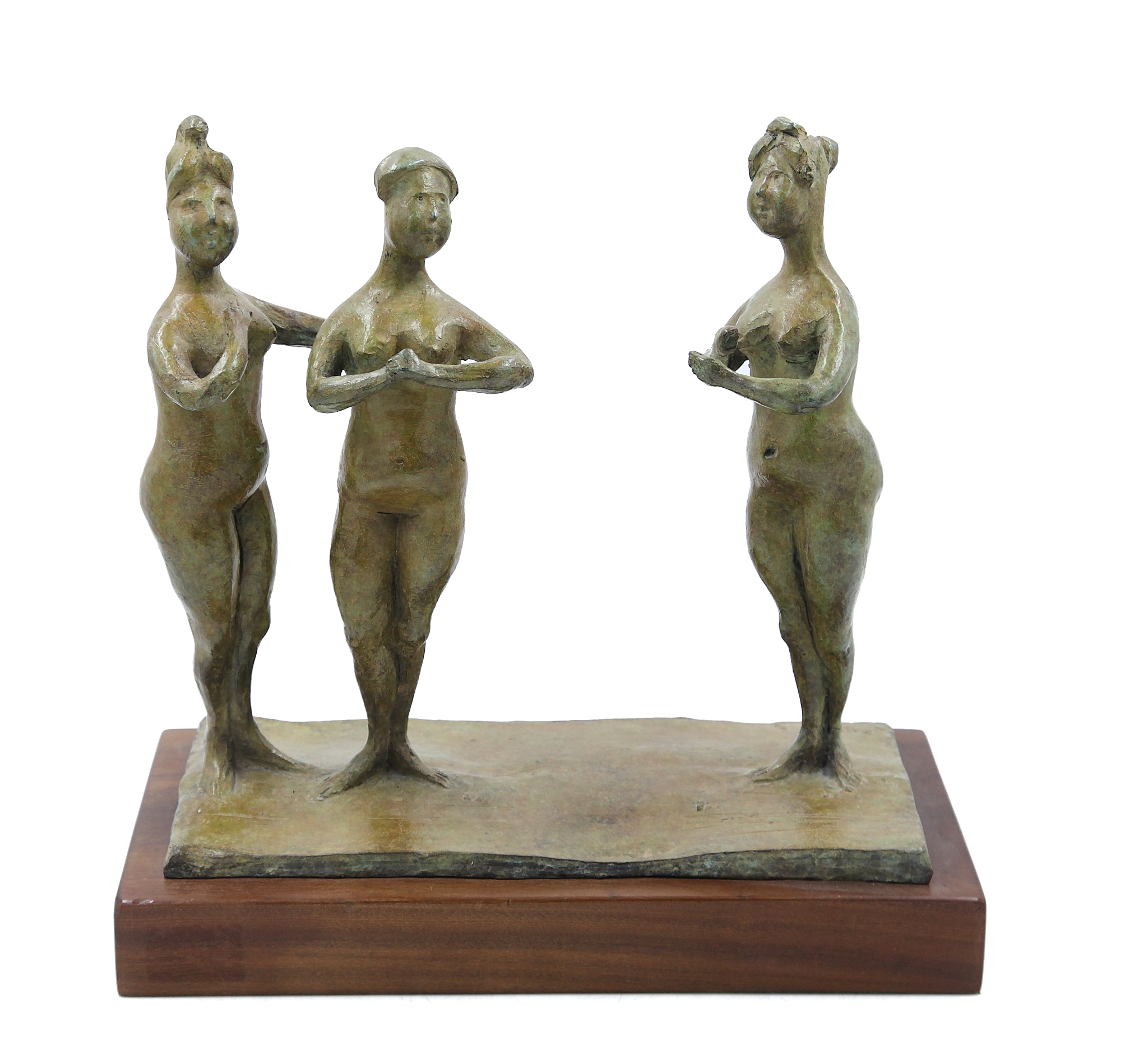 A bronze smaller scale sculpture showing three female figures stood up with their hands together.