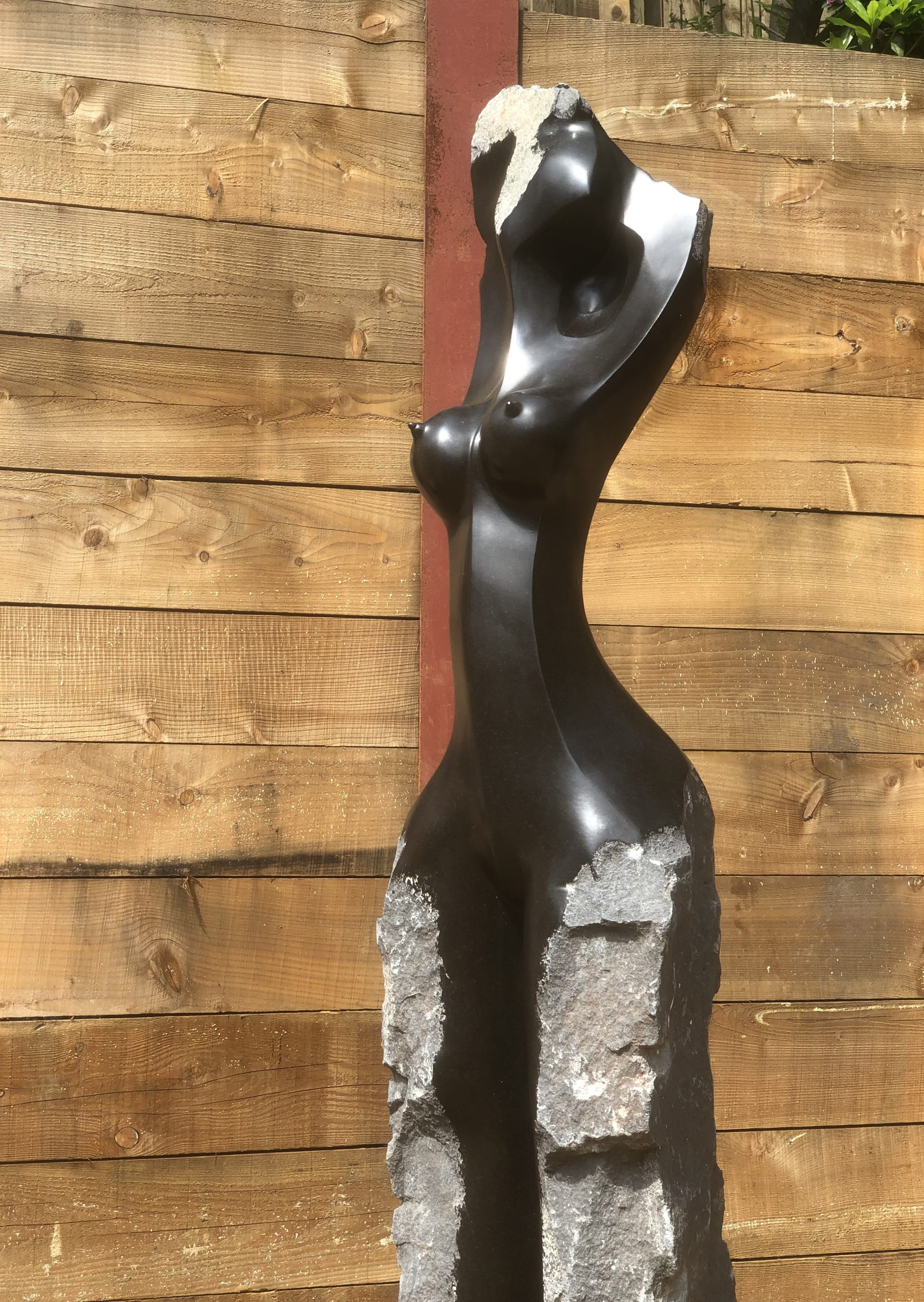 Proud of my Body by Tendai Rukodzi is a Zimbabwean Shona Springstone sculpture of nude woman's torso