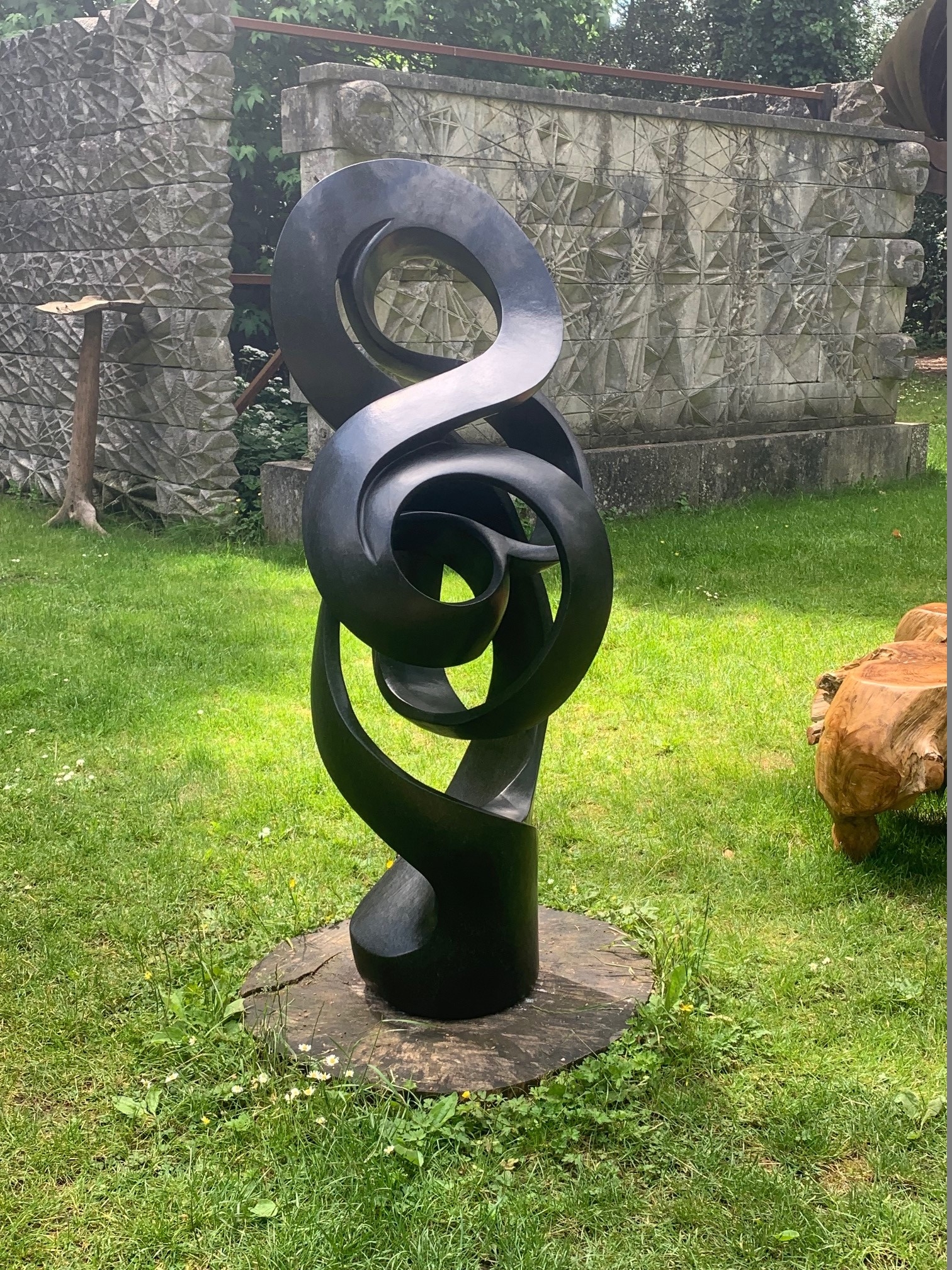 Path of True Love by Sign is an Abstract black stone sculpture of a twisted, spiralling form