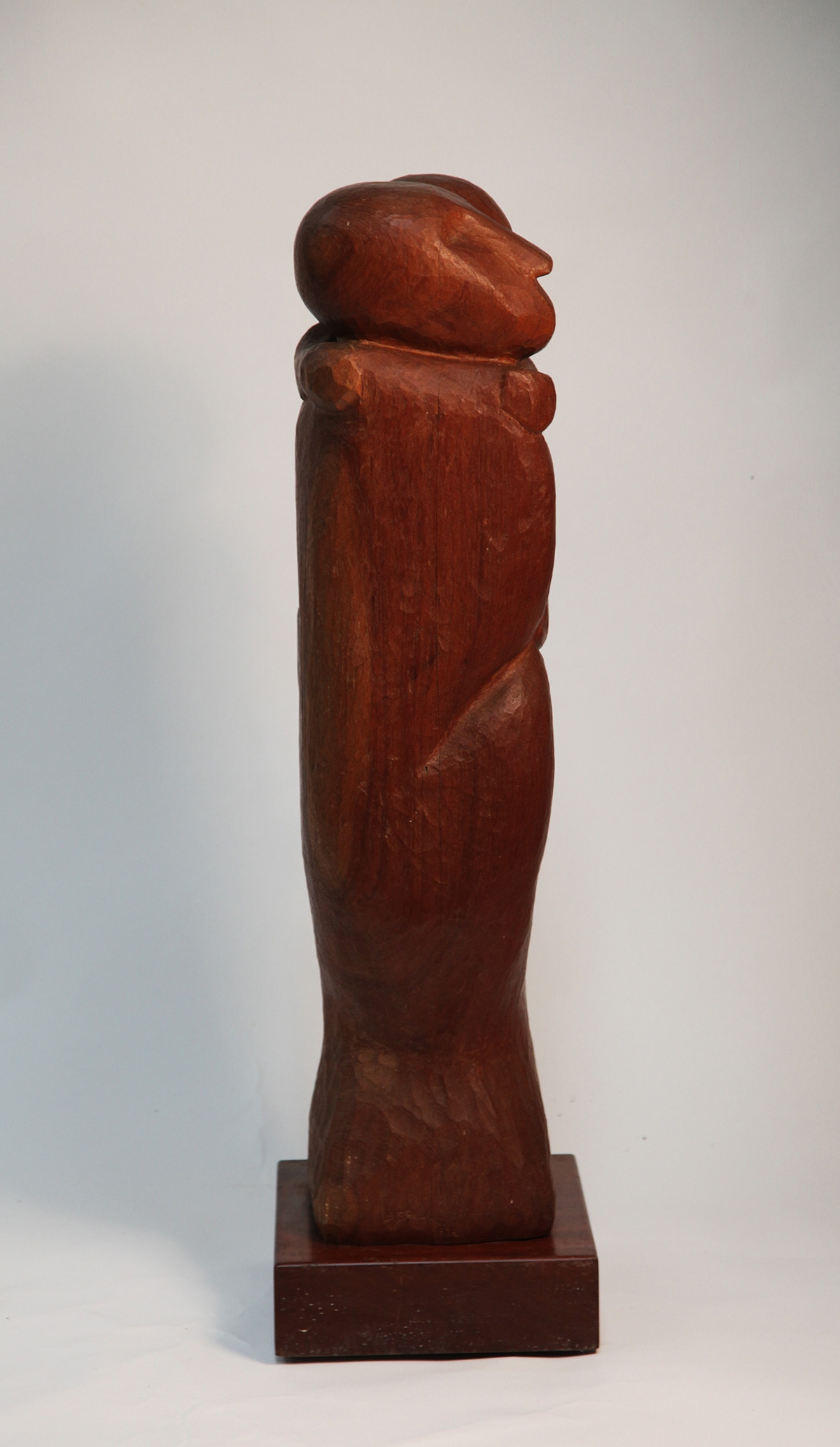 Tall Slim Wooden Carved Rectangular Sculpture of a Mother Holding Her Child