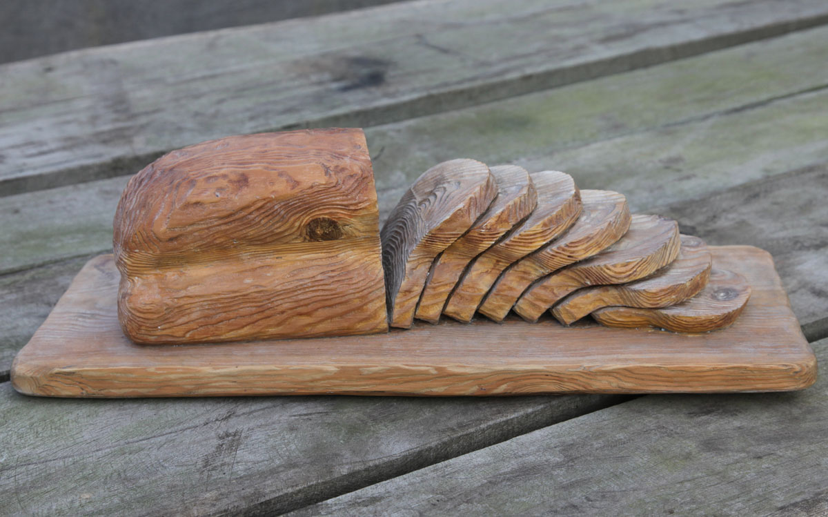 Bronze Sculpture Cast from A Wooden Carving of a Sliced Loaf of Bread