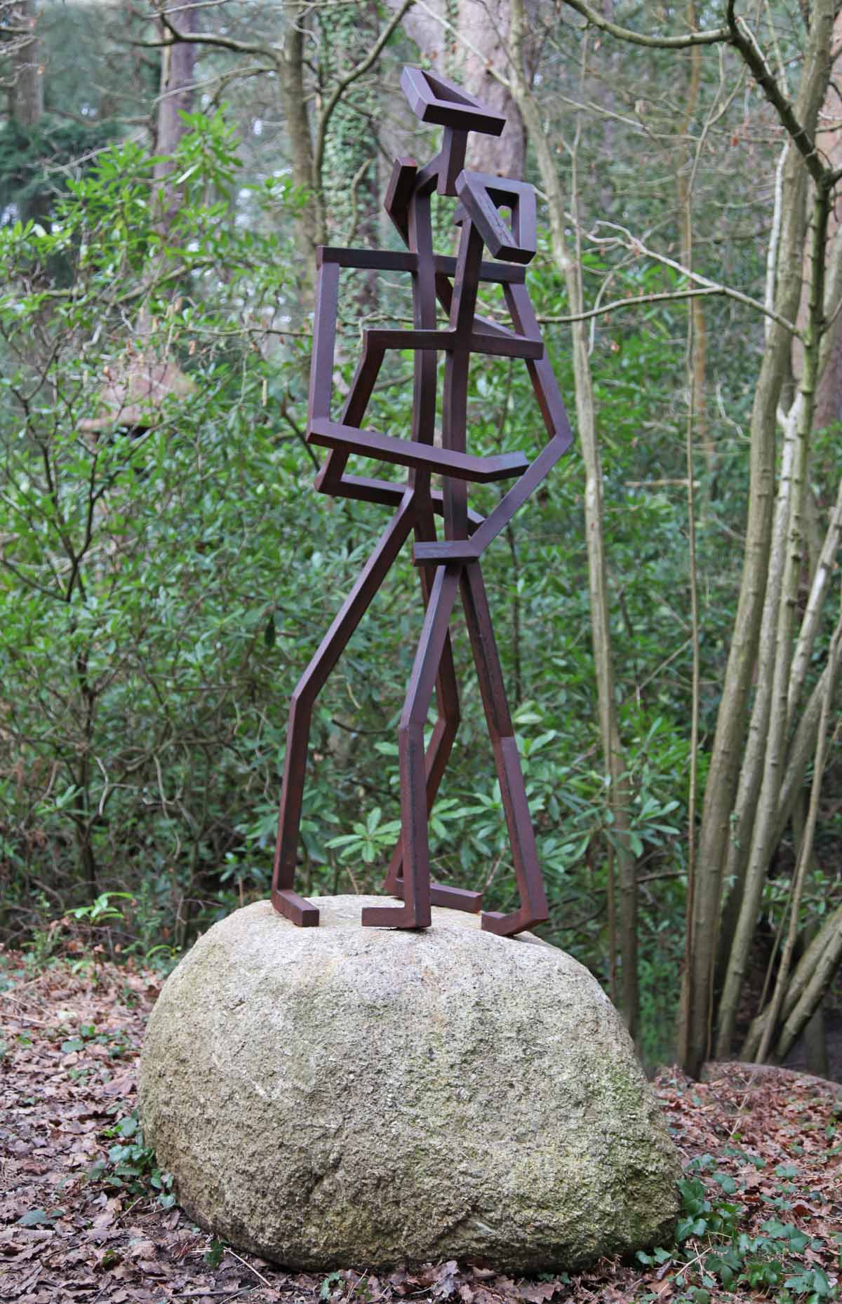 Monumental Outdoor Sculpture Depicting Two Stick People Made from Welded Steel Standing Upon a Rock
