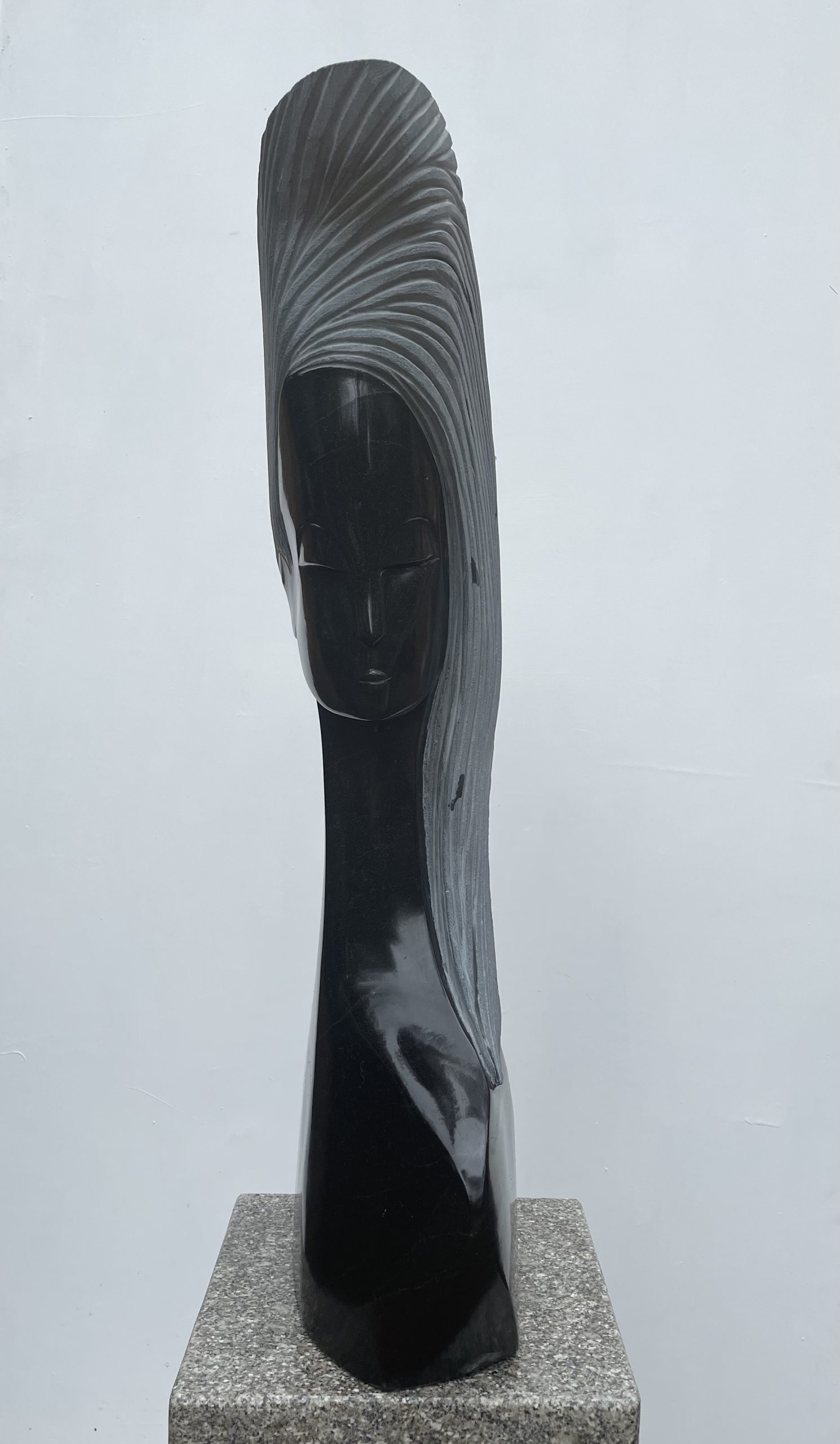 Supermodel by Tutani Mugavazi is a Shona sculpture of a woman's head and shoulders.