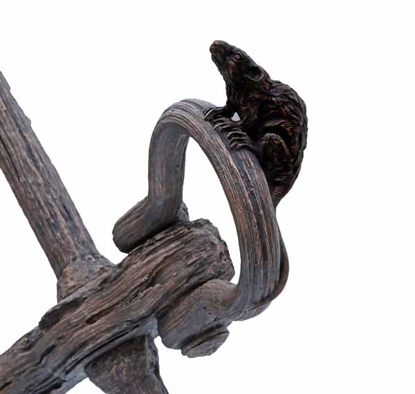 A realism bronze sculpture of a large anchor with a rat and mouse climbing on top of it.