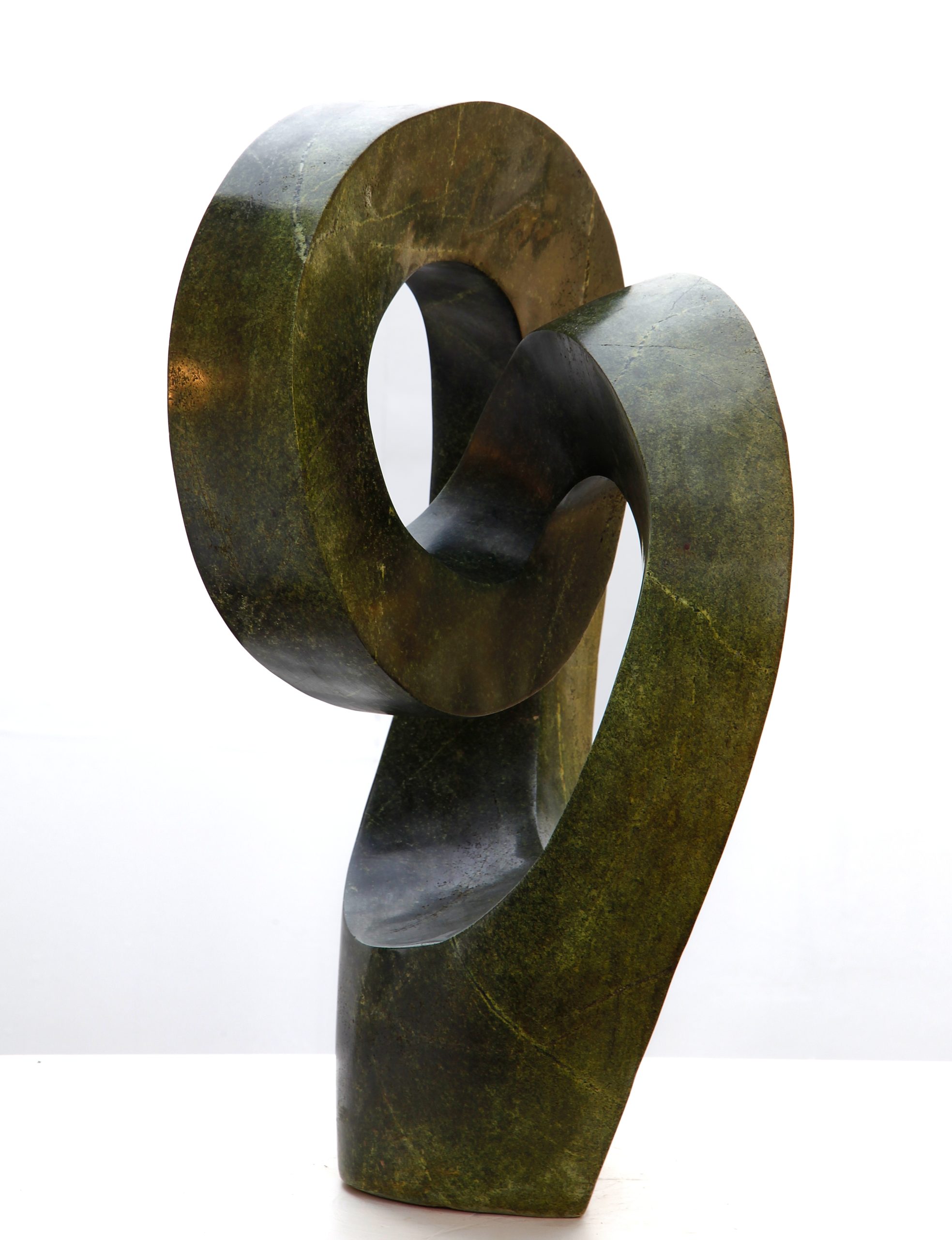 An abstract Shona sculpture made of Avocado stone.