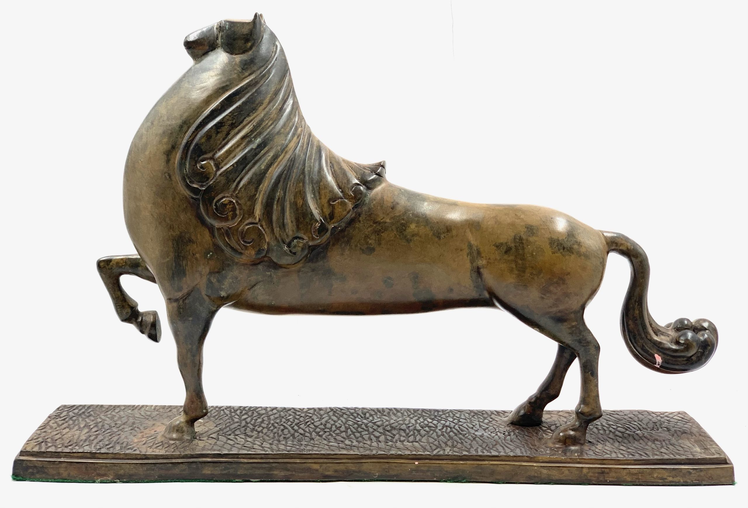 A bronze sculpture of an abstract horse.